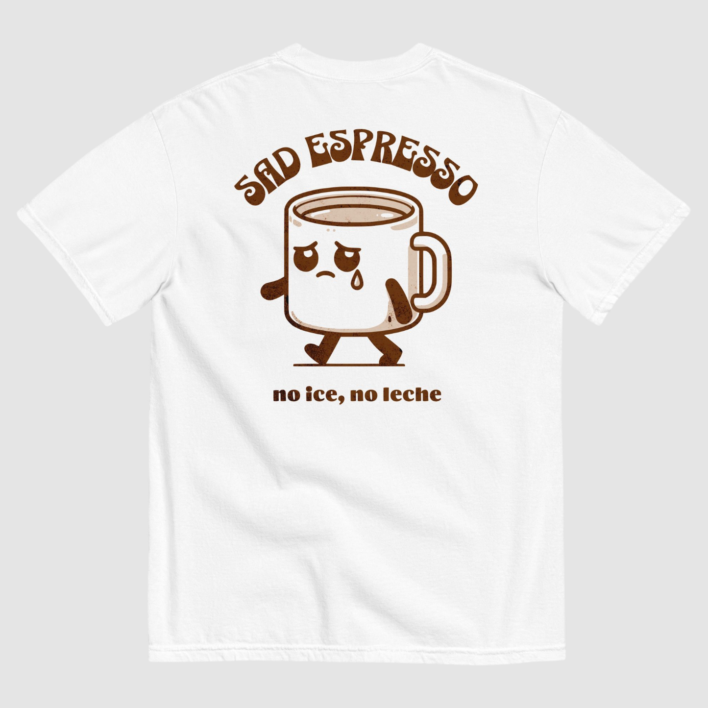 White tshirt with a graphic of a sad espresso cup with 'sad espresso' written above it and 'no ice, no leche', written below it in coffee colour