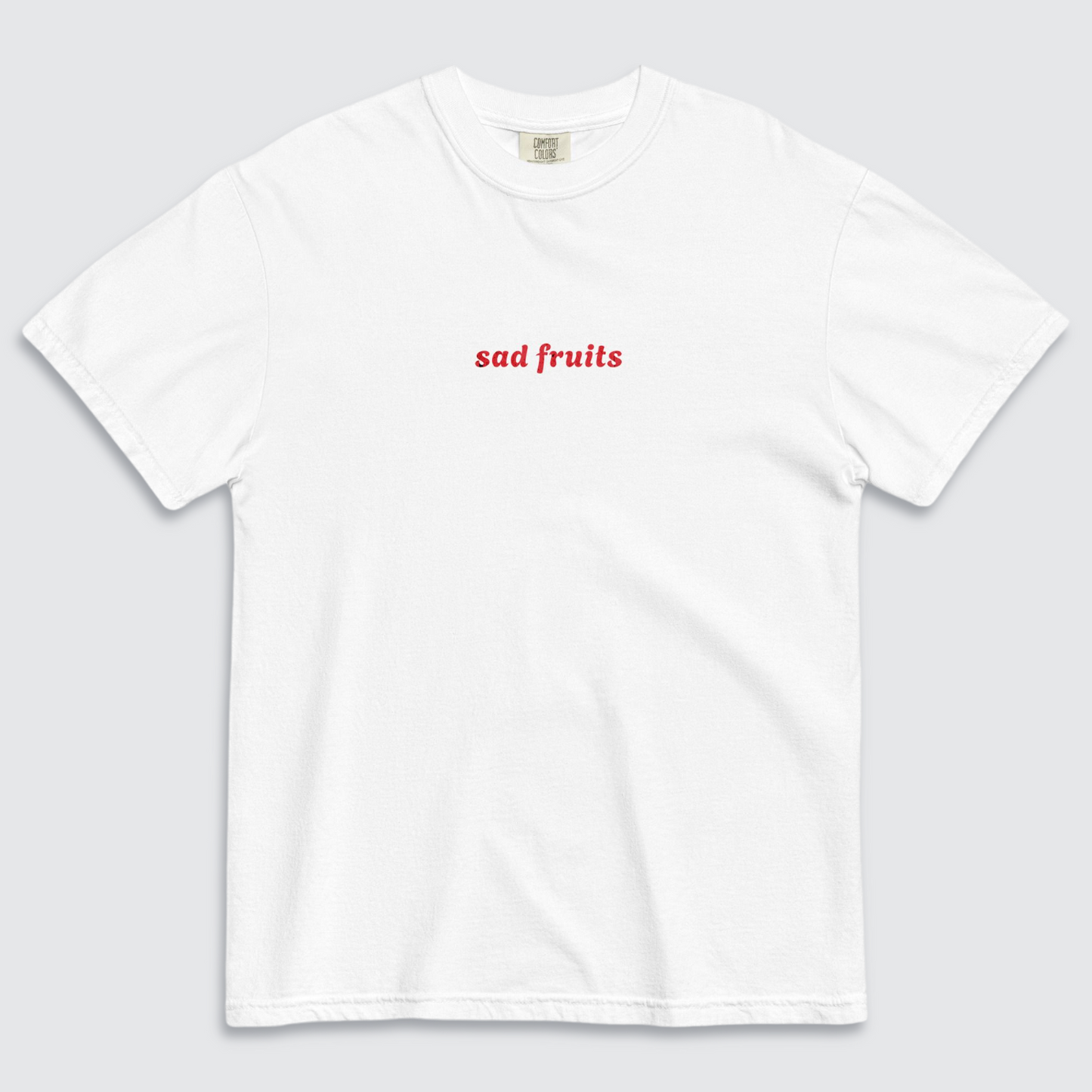 White tshirt with 'sad fruits' written in red text across the chest
