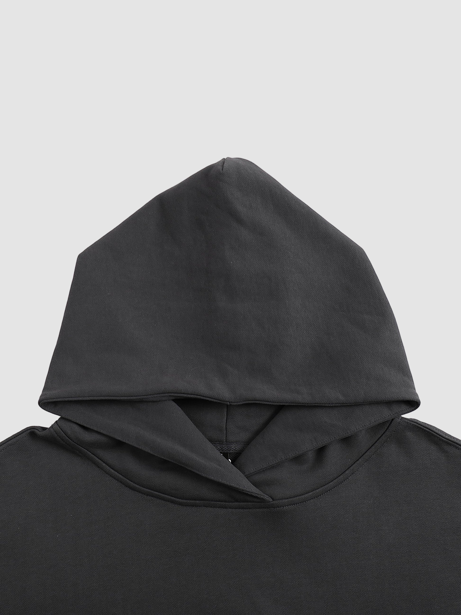 Black hoodie with a hood on a white background