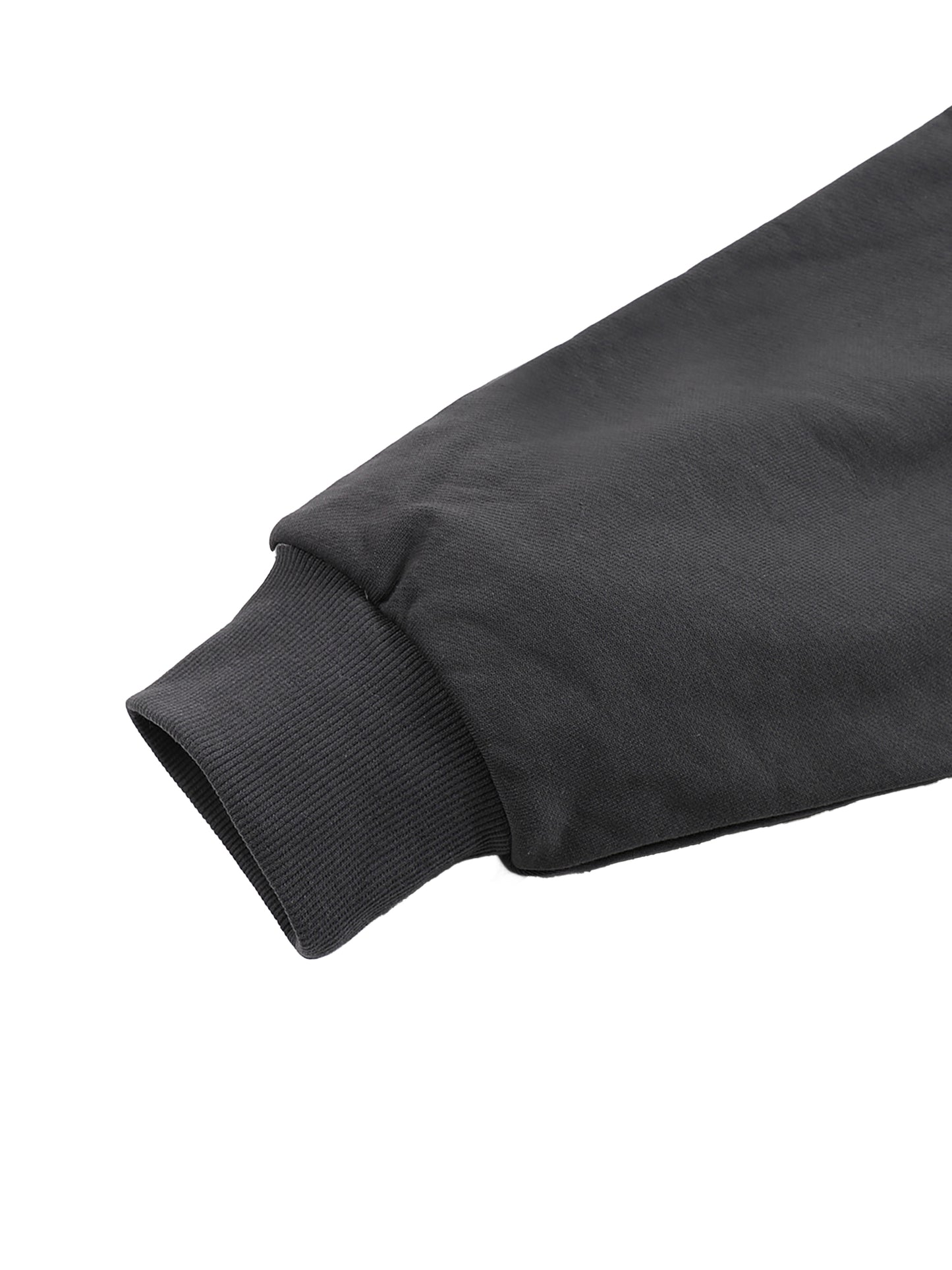 Close-up of a black sleeve on a white background